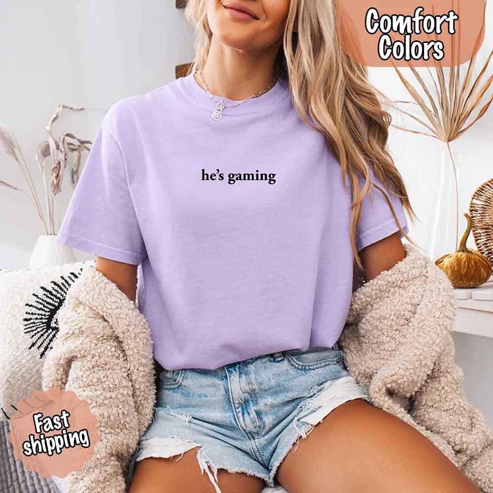 He’s Gaming – Funny Relationship Comfort Color Shirt for Her